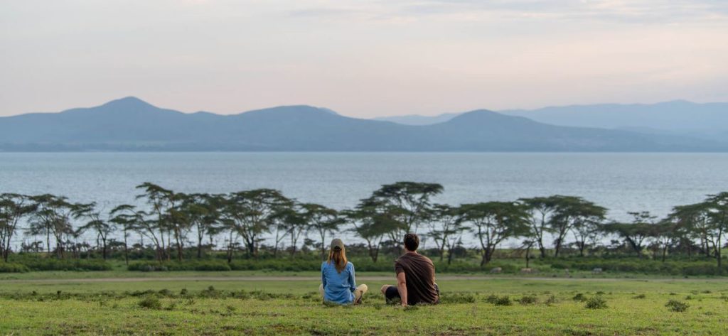 Guests enjoying a view of Lake Naivasha while in Crescent Island Game Sanctuary